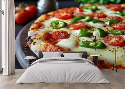 Mouthwatering close-up of cheesy pepper pizza topped with fresh tomatoes and vibrant green peppers, highlighting gooey melted cheese and tempting flavors. Wall mural