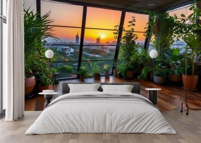 Panoramic city view from a stunning urban garden loft at sunset adorned with lush plants and cozy wooden flooring Wall mural