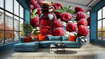 Raspberry seed oil elegantly displayed with fresh raspberries and scattered seeds for a vibrant natural appeal Wall mural