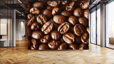 Rich texture of roasted coffee beans in close-up, showcasing deep brown hues and inviting aromas. Wall mural