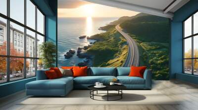 Scenic coastal road winding along the ocean with breathtaking views Wall mural