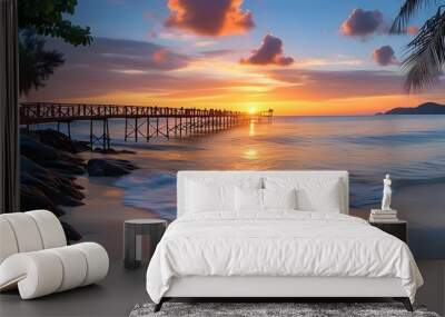 Serene beach footbridge bathed in sunrise light inviting relaxation and tranquility on vacation Wall mural