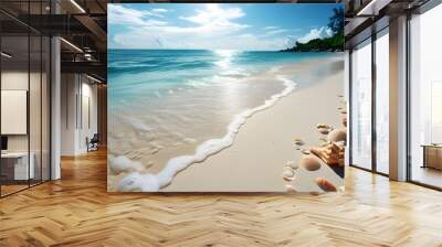 Serene tropical beach with pristine sand, scattered seashells, and shimmering sea under a sunny sky. Wall mural