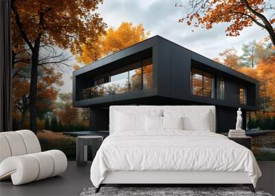 Sleek minimalist black house nestled among vibrant autumn trees, embodying contemporary architecture and harmonious urban living with nature Wall mural