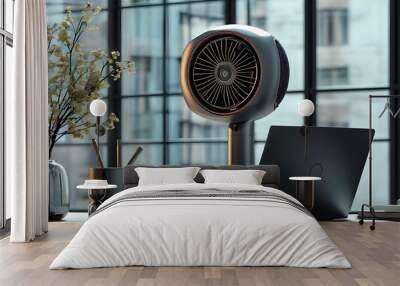 Sleek office fan and laptop in cinematic advertising showcasing advanced technology and productivity Wall mural