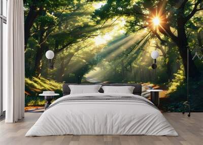 Sunlit forest road in the countryside with rays of light filtering through the tree canopy Wall mural