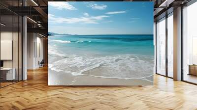 Tranquil beach paradise with azure waters and soft white sand under a bright sun Wall mural