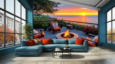 Tranquil sunset over the ocean from a cozy patio, with a fire pit, inviting chairs, and colorful flowers inviting relaxation Wall mural