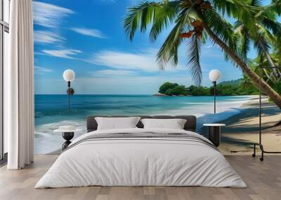 Tropical paradise with palm trees, coconuts, and a sunlit sea view under a clear blue sky Wall mural