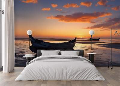 Twilight Serenity: Rustic Roll Boat on a Low Tide Beach Under an Orange Sky Wall mural