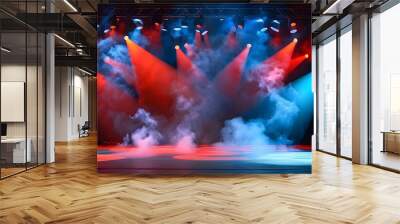 Vibrant stage illuminated by dynamic red and blue spotlights amidst swirling smoke Wall mural