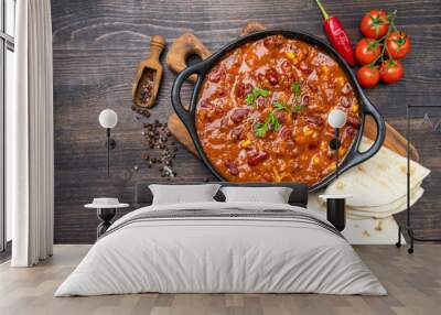 Bean and corn soup or ragout, red bean stew  on a wooden background. Food Protein Vegan dish Wall mural