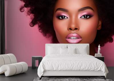 Beautiful black skin woman with pink lips, fashion make up eyeshadow, on pink background Wall mural