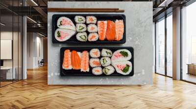 food delivery. set of sushi and rolls with salmon and shrimp. service food order online and home delivery during the COVID-19 coronavirus quarantine . concept layout 2 for the price of 1. Wall mural