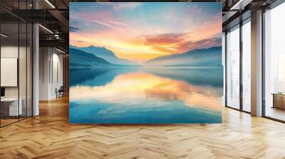 A picturesque landscape of a mountain lake at sunrise, with calm waters and a colorful sky Wall mural