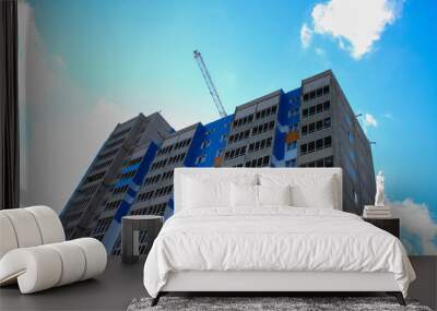 Construction of multi-storey buildings, blue sky Wall mural