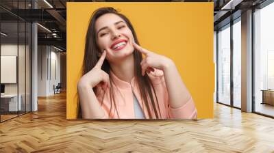 Charming girl making smile Wall mural