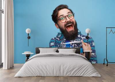 Crazy man happy with present Wall mural