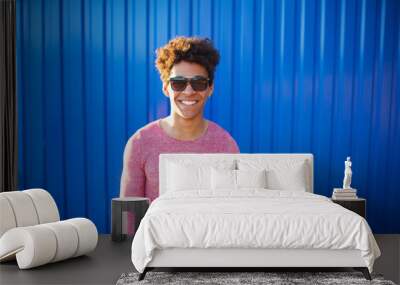 Head and shoulders portrait of young African American man Wall mural