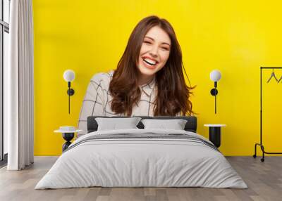 Laughing woman with hands crossed Wall mural