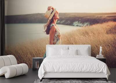 Modern girl in light summer dress Wall mural