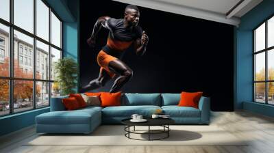 A strong athletic, man sprinter, running on black background wearing in the sportswear, fitness and sport motivation concept Wall mural