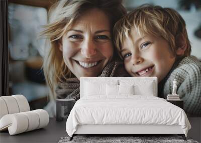 Affectionate moment between smiling Scandinavian mother and nordic blond son at home, showcasing a warm, loving family dynamic Wall mural