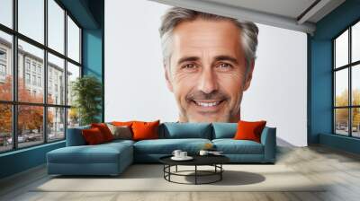 Beautiful portrait of a 50s mid aged mature man looking at camera isolated on white background Wall mural