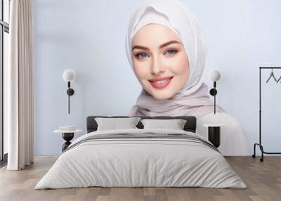 Caucasian Muslim woman with blue eyes portrait isolated on white background Wall mural