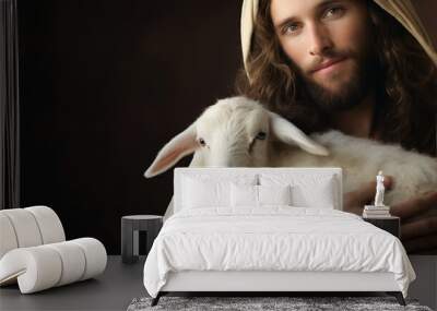 Christian banner with Jesus Christ gently holding a cute lamb with sense of protection and care, copy space Wall mural