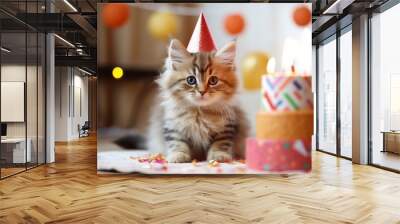 Cute cat kitten celebrating his birthday with home party and cake Wall mural