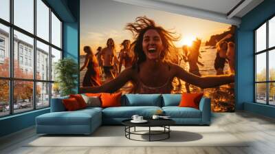 Friends party on the beach in summer , woman dancing at the rhythm of the festive music Wall mural