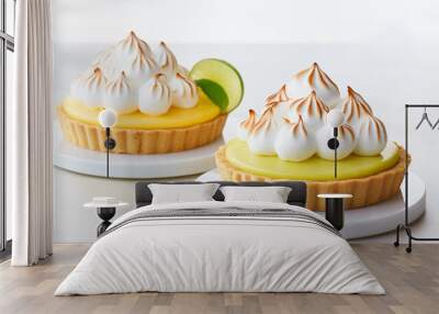 Key lime pie and lemon meringue tart on a pure white surface Wall mural