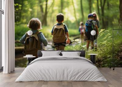 Kids taking a nature hike through a lush forest, exploring the beauty of the outdoors. The trail lead to a serene clearing Wall mural