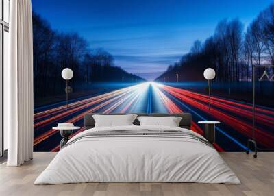 Long exposure of a road with light trails of passing vehicles at night Wall mural