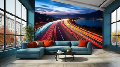 Long exposure of a road with light trails of passing vehicles at night Wall mural