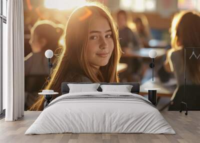 Portrait of a 14 year old teenage girl sitting in a classroom in early morning on back to school day Wall mural