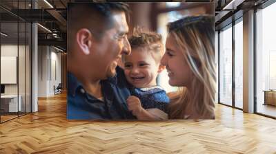 Portrait of a latin american family with parents and their young toddler kid at happy home Wall mural