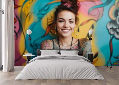 Portrait of a young caucasian tattooed happy woman on colorful background Wall mural