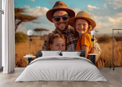 Portrait of an happy caucasian family doing a safari in Africa Wall mural