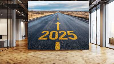 Road to 2025 with an empty road with written 2025 and arrow pointing towards the horizon to represent the future and positivity and success of the new year 2025 Wall mural