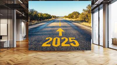 Road to 2025 with an empty road with written 2025 and arrow pointing towards the horizon to represent the future and positivity and success of the new year 2025 Wall mural