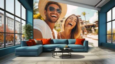 Selfie picture of a young happy couple outside on vacation , handsome boyfriend and beautiful girlfriend having fun on summer holiday Wall mural