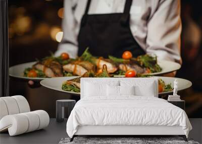 Waiter carrying plates with fish dish on some festive event, party or wedding reception restaurant Wall mural