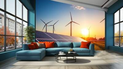 Windmill wind turbine and solar cell panel on blue sky at sunset , renewable electricity energy concept Wall mural