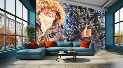 person in winter forest Wall mural