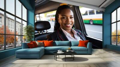 black woman in transport industry driver at car vehicle, diversity and inclusion, woman in male-dominated job Wall mural