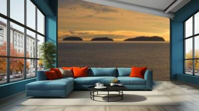 A ultra wide panorama view of a golden sunset ocean Wall mural