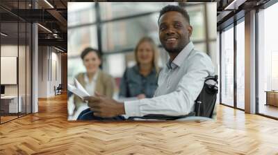 Empowered African American man in wheelchair smiling during meeting Wall mural