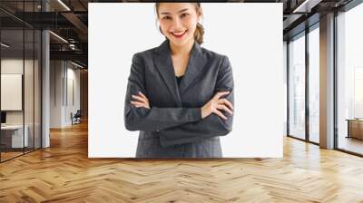 Portrait of businesswoman smiling and posing with arms crossed, isolated on a white background. Wall mural